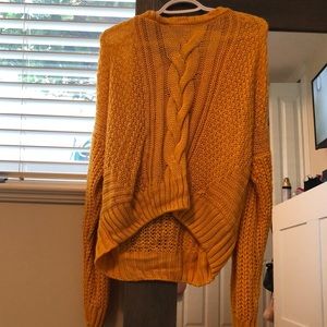 Yellow knitted sweater